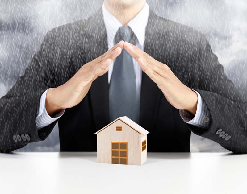 home insurance concept under rain